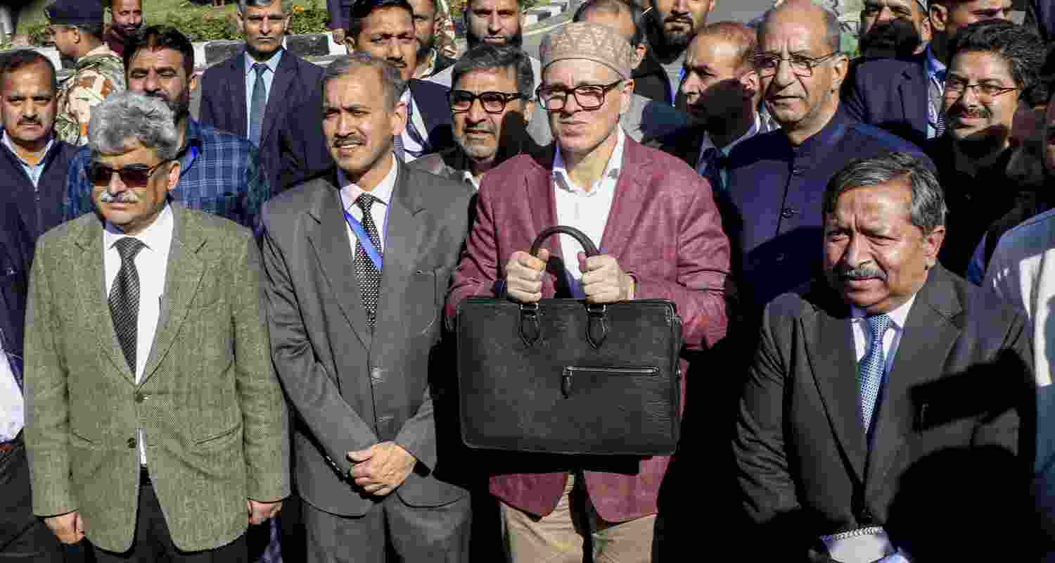 Jammu and Kashmir Chief Minister Omar Abdullah arrives to present the budget during the Budget session of the legislative Assembly, in Jammu on Friday. Jammu and Kashmir Chief Minister Omar Abdullah arrives to present the budget during the Budget session of the legislative Assembly, in Jammu on Friday.