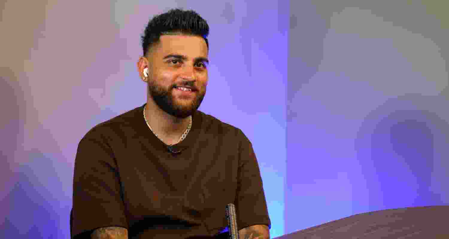 Karan Aujla at an interview. Karan Aujla at an interview.