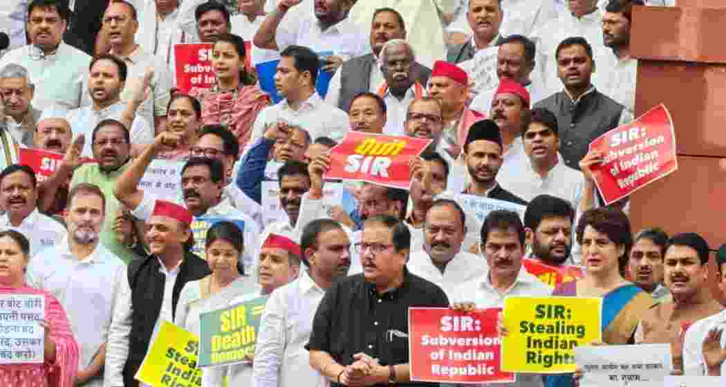 Opposition MPs, including Lok Sabha LoP Rahul Gandhi, Samajwadi Party chief Akhilesh Yadav, protest at Makar Dwar of Parliament over the issue of SIR (Special Intensive Review) exercise in Bihar. Opposition MPs, including Lok Sabha LoP Rahul Gandhi, Samajwadi Party chief Akhilesh Yadav, protest at Makar Dwar of Parliament over the issue of SIR (Special Intensive Review) exercise in Bihar.