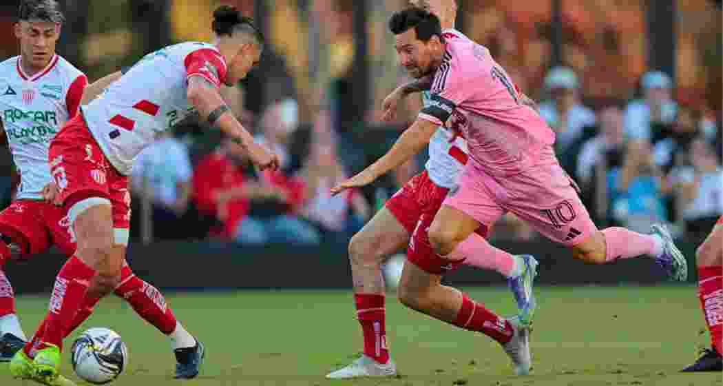 Inter Miami’s Lionel Messi goes down clutching his thigh after a challenge from Necaxa’s Alexis Pena and Raul Sanchez. Inter Miami’s Lionel Messi goes down clutching his thigh after a challenge from Necaxa’s Alexis Pena and Raul Sanchez.
