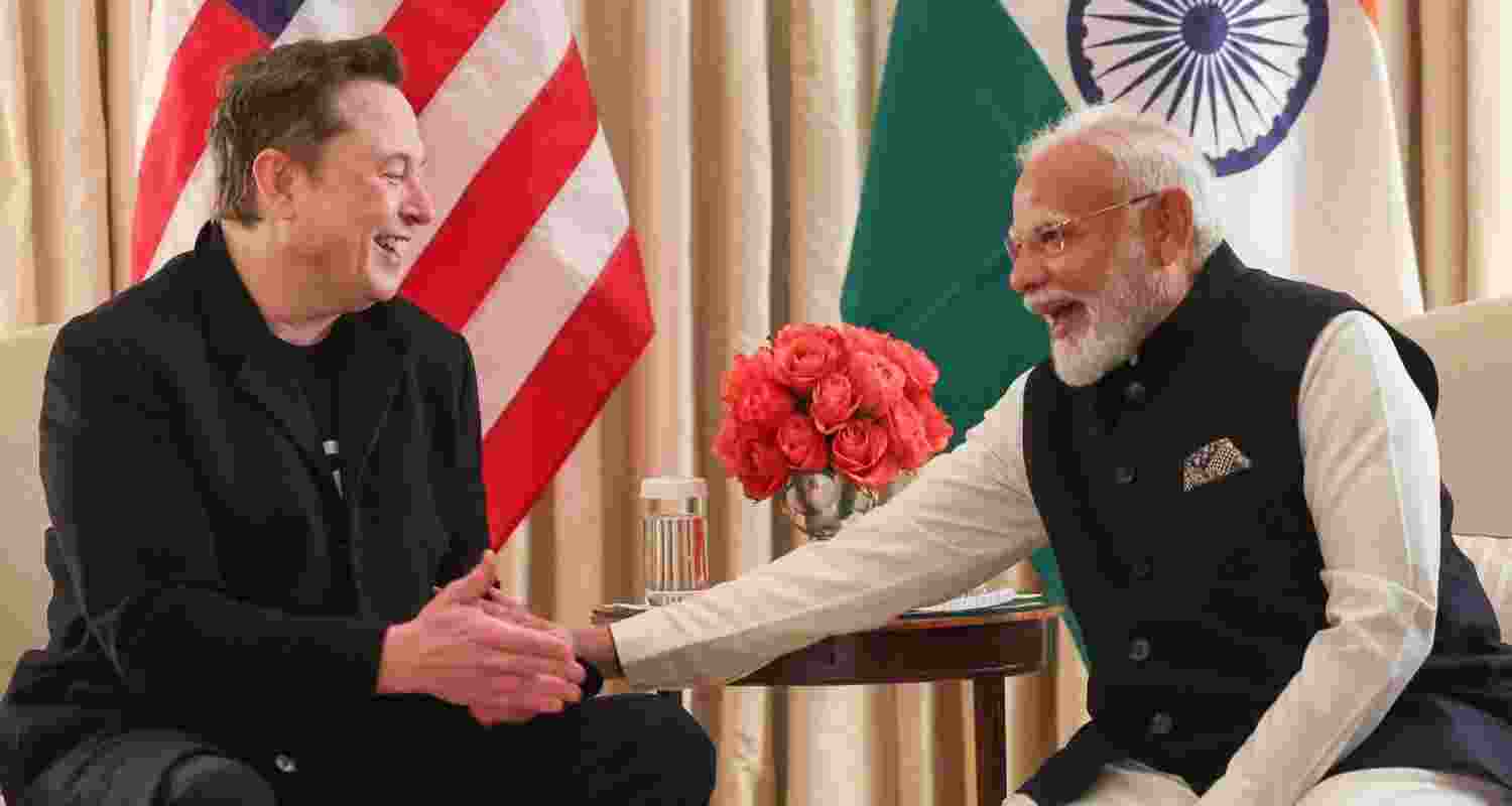 PM Modi and Elon Musk share a light moment at their meeting at the Blair House. PM Modi and Elon Musk share a light moment at their meeting at the Blair House.