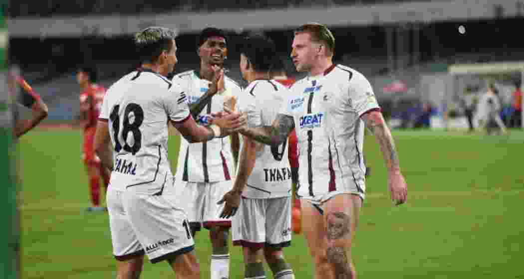 Mohun Bagan SG players celebrate after scoring against Diamond Harbour FC in Durand Cup 2025. Mohun Bagan SG players celebrate after scoring against Diamond Harbour FC in Durand Cup 2025.