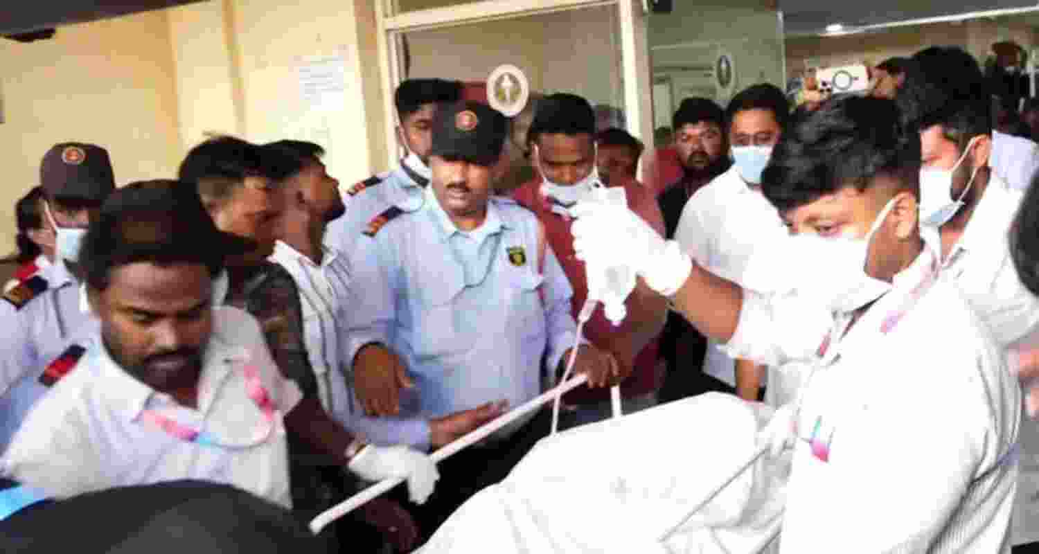 A file photo of medical staff in Odisha hospital bringing out the victim girl to be airlifted to Delhi. A file photo of medical staff in Odisha hospital bringing out the victim girl to be airlifted to Delhi.