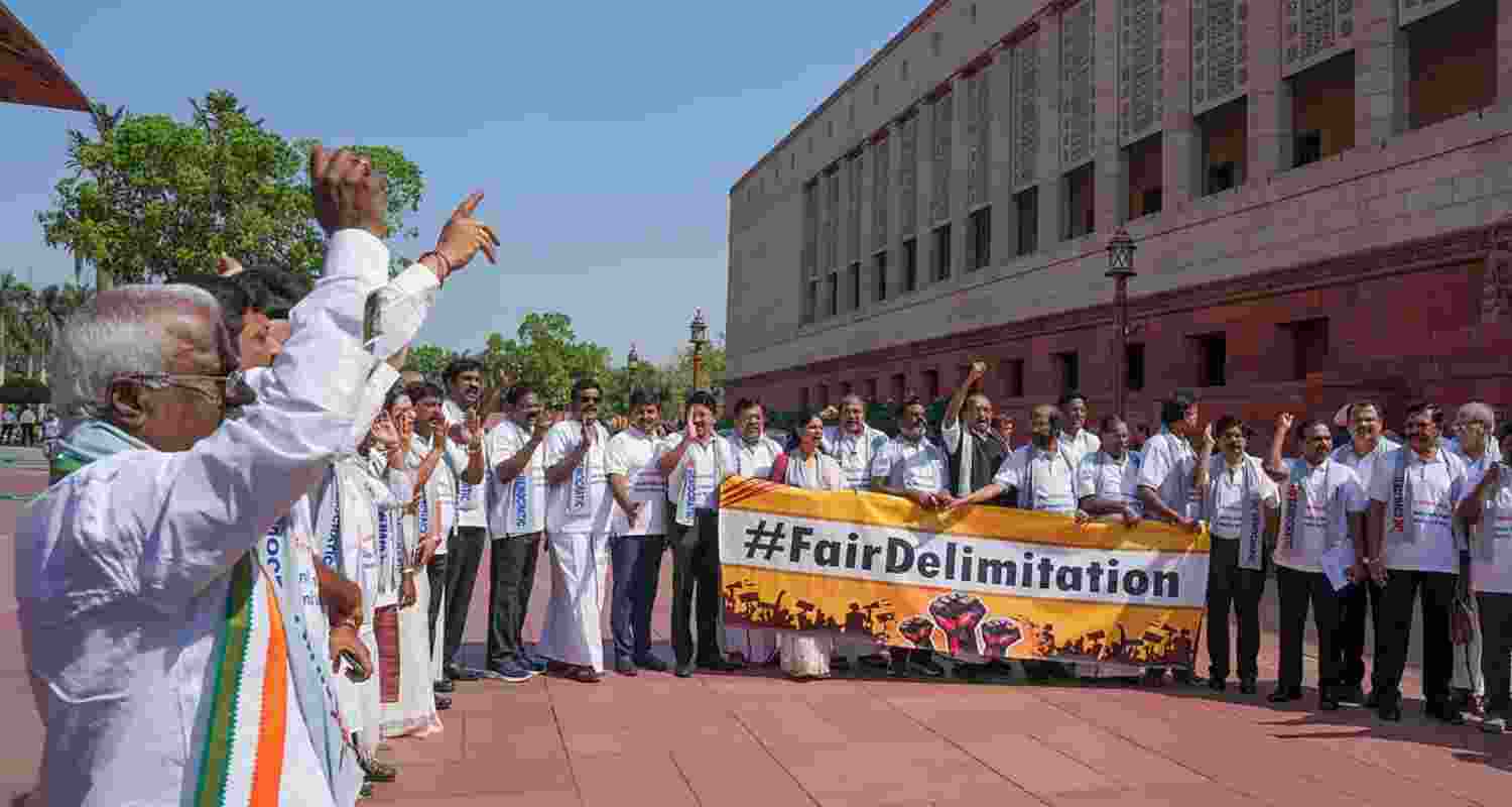 DMK MPs protest during the Budget session of Parliament, in New Delhi, Thursday. DMK MPs protest during the Budget session of Parliament, in New Delhi, Thursday.