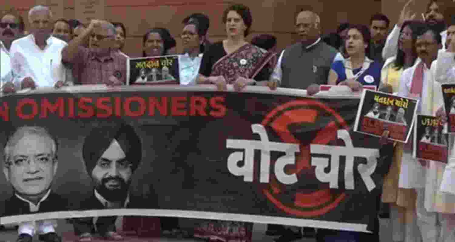 INDIA alliance MPs, including Mallikarjun Kharge, Priyanka Gandhi Vadra, protest against the Special Intensive Revision (SIR) of electoral rolls in poll-bound Bihar and allegations of 'vote chori' against the BJP and the Election Commission of India. INDIA alliance MPs, including Mallikarjun Kharge, Priyanka Gandhi Vadra, protest against the Special Intensive Revision (SIR) of electoral rolls in poll-bound Bihar and allegations of 'vote chori' against the BJP and the Election Commission of India.