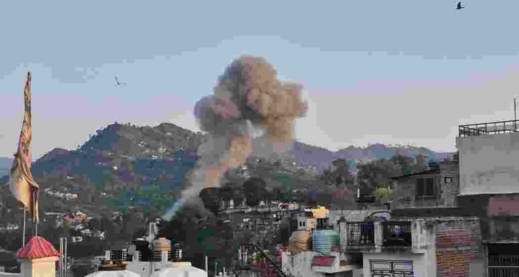 Smoke rises from a residential area in Jammu after intense shelling by Pakistan caused extensive damage to homes and infrastructure. Local officials have urged residents to remain vigilant amid ongoing cross-border attacks. Smoke rises from a residential area in Jammu after intense shelling by Pakistan caused extensive damage to homes and infrastructure. Local officials have urged residents to remain vigilant amid ongoing cross-border attacks.