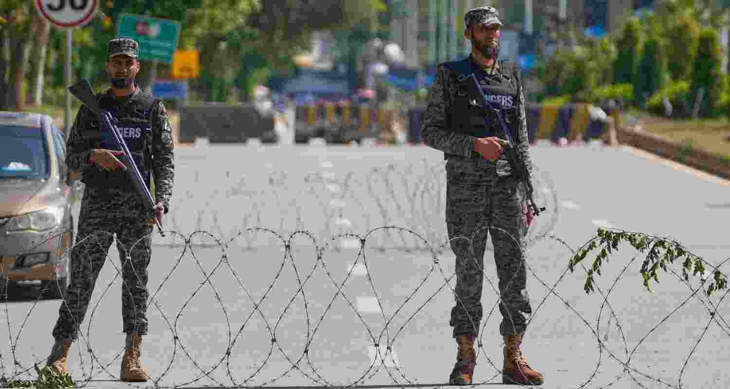 Soldiers stand guard at a checkpoint to ensure security ahead of the United States and Iran possible negotiations in Pakistani capital. Soldiers stand guard at a checkpoint to ensure security ahead of the United States and Iran possible negotiations in Pakistani capital.