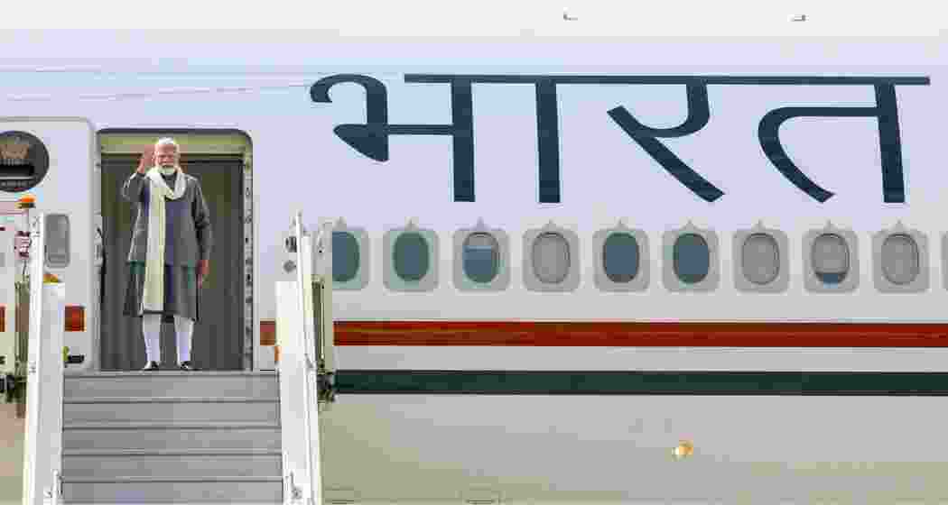 Prime Minister Narendra Modi emplanes for Paris, France, in New Delhi on Monday. Prime Minister Narendra Modi emplanes for Paris, France, in New Delhi on Monday.