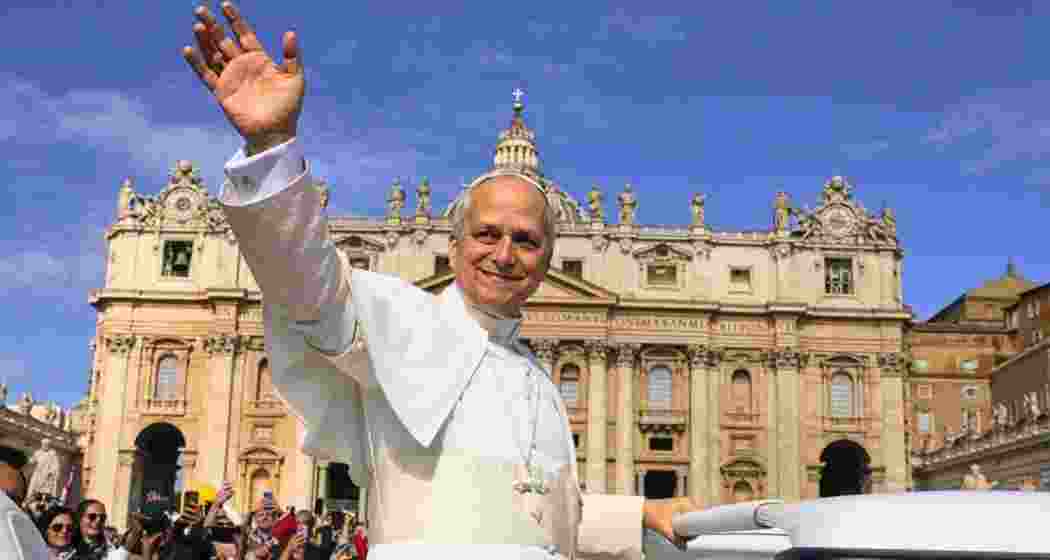 Pope Leo XIV waves to thousands as he rides the popemobile through St. Peter’s Square before his installation ceremony on Sunday. Pope Leo XIV waves to thousands as he rides the popemobile through St. Peter’s Square before his installation ceremony on Sunday.