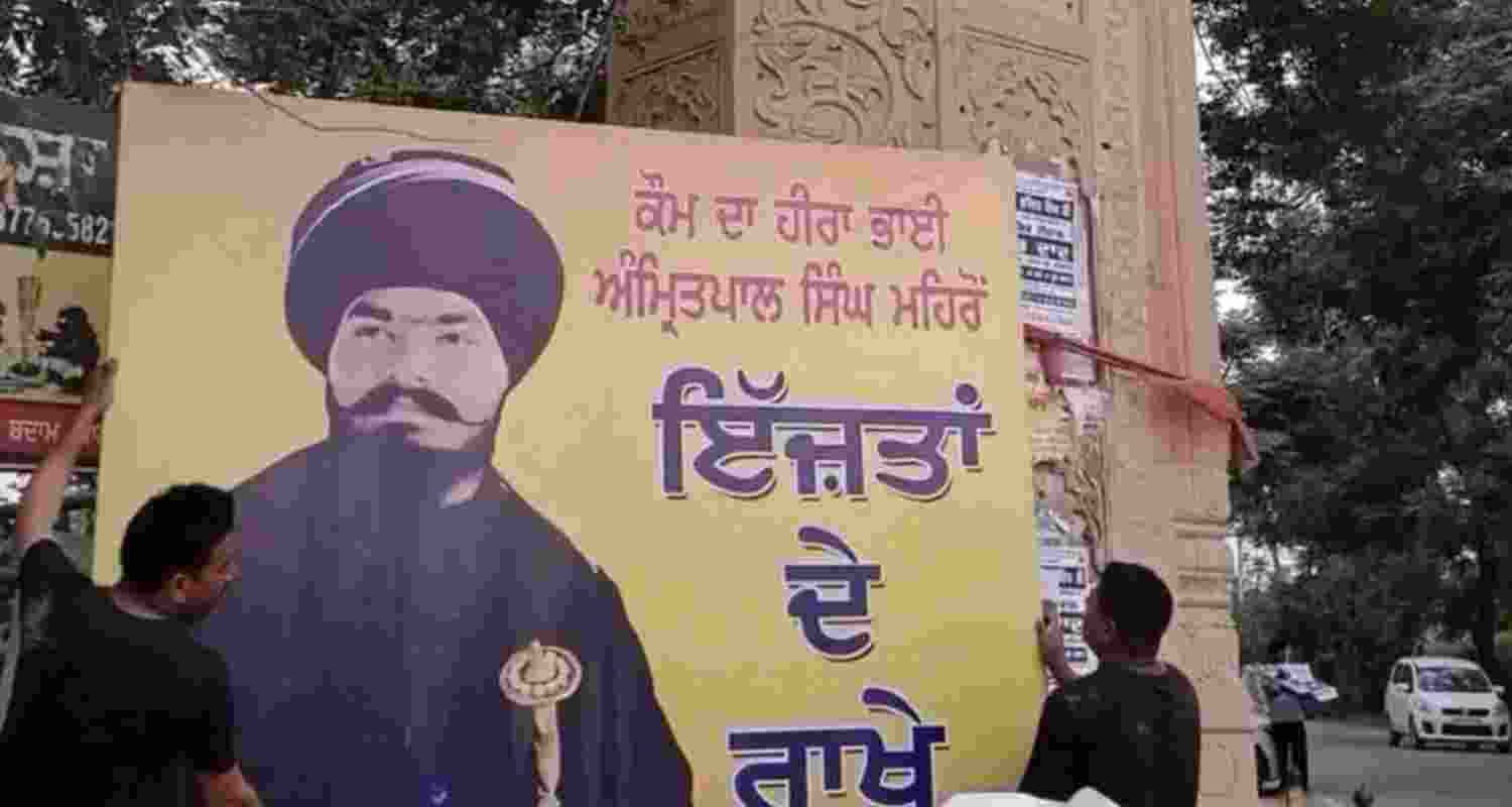 Posters of murder accused Amritpal Singh Mehron surface ahead of bypoll. Posters of murder accused Amritpal Singh Mehron surface ahead of bypoll.