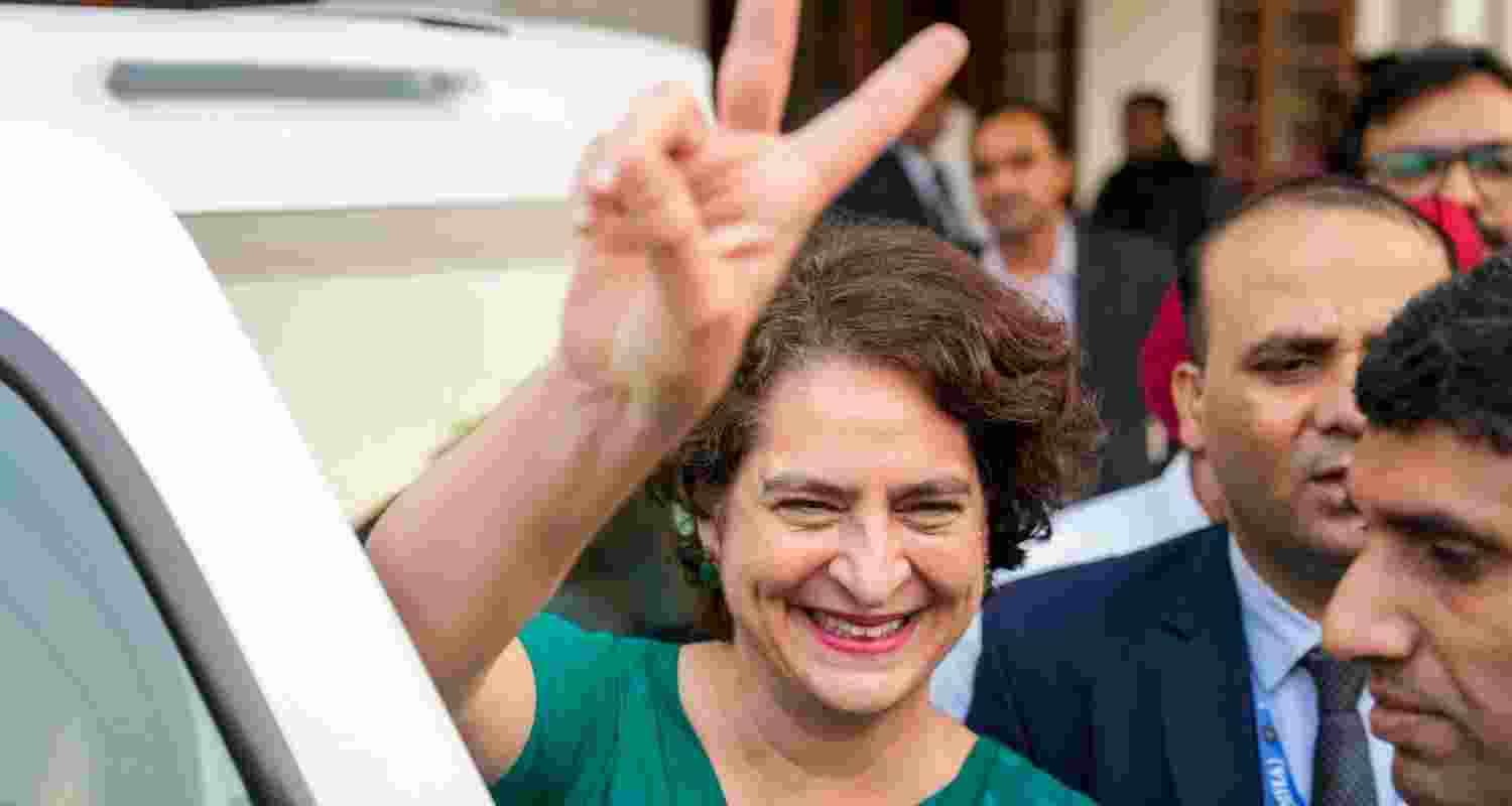 Congress General Secretary Priyanka Gandhi Vadra flashes victory sign as she leaves after meeting party President Mallikarjun Kharge following her massive victory in the Wayanad Lok Saha by-poll, in New Delhi, Saturday. Congress General Secretary Priyanka Gandhi Vadra flashes victory sign as she leaves after meeting party President Mallikarjun Kharge following her massive victory in the Wayanad Lok Saha by-poll, in New Delhi, Saturday.