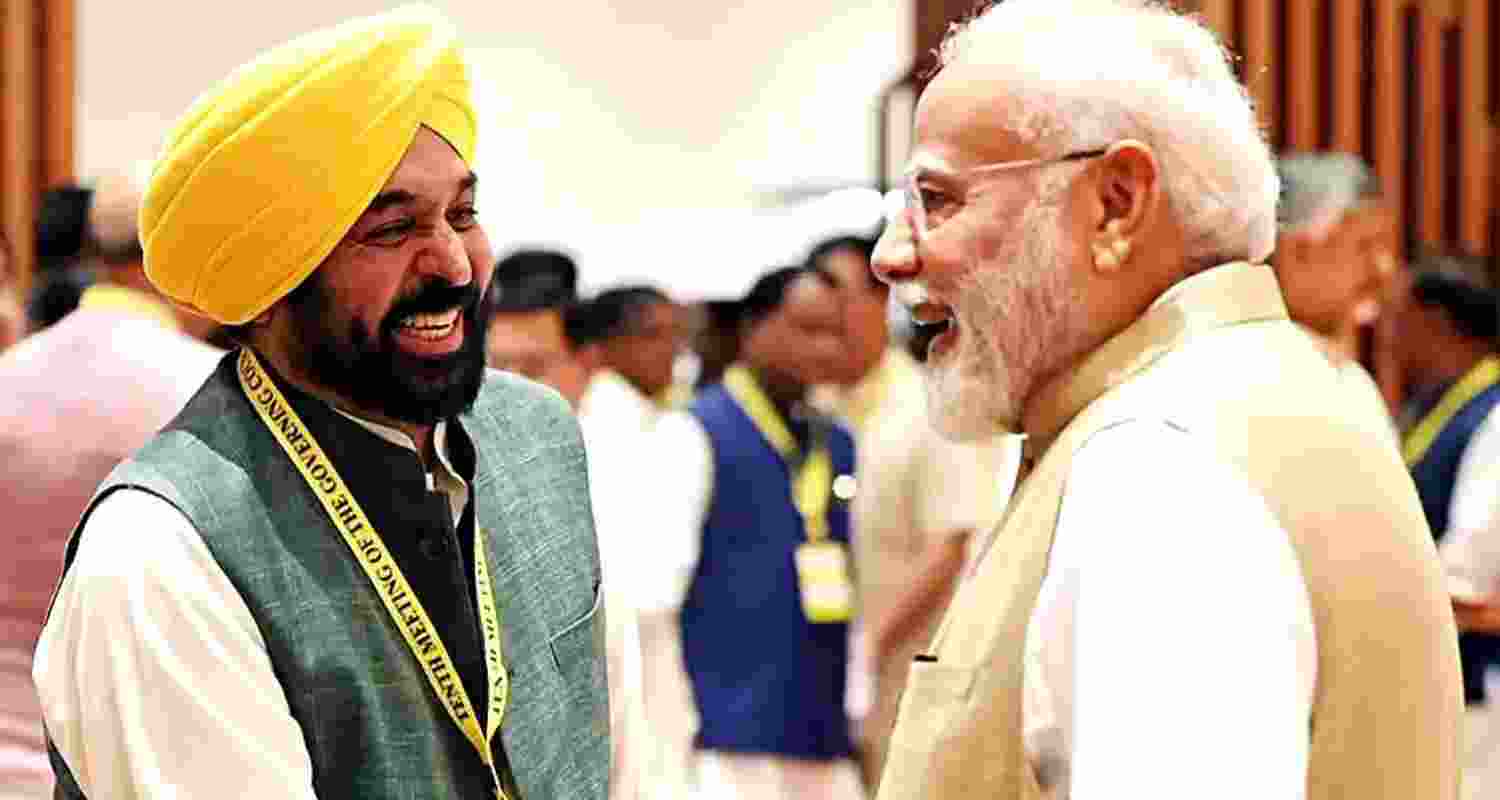 Punjab Chief Minister Bhagwant Mann with Prime Minister Narendra Modi during the 10th NITI Aayog Governing Council Meeting in New Delhi on Saturday. Punjab Chief Minister Bhagwant Mann with Prime Minister Narendra Modi during the 10th NITI Aayog Governing Council Meeting in New Delhi on Saturday.