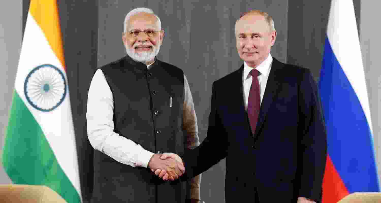 A file photo of Vladimir Putin and Narendra Modi. A file photo of Vladimir Putin and Narendra Modi.