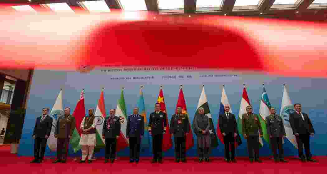 Chinese Defense Minister Dong Jun, center, leads other heads of defense including Russian Defense Minister Andrei Belousov, fourth right, Iran Defense Minister Aziz Nasirzadeh, fourth left, for a group photo ahead of the Defense Ministers' Meeting of the Shanghai Cooperation Organization Members States in Qingdao in eastern China's Shandong province on Thursday, June 26, 2025. Chinese Defense Minister Dong Jun, center, leads other heads of defense including Russian Defense Minister Andrei Belousov, fourth right, Iran Defense Minister Aziz Nasirzadeh, fourth left, for a group photo ahead of the Defense Ministers' Meeting of the Shanghai Cooperation Organization Members States in Qingdao in eastern China's Shandong province on Thursday, June 26, 2025.