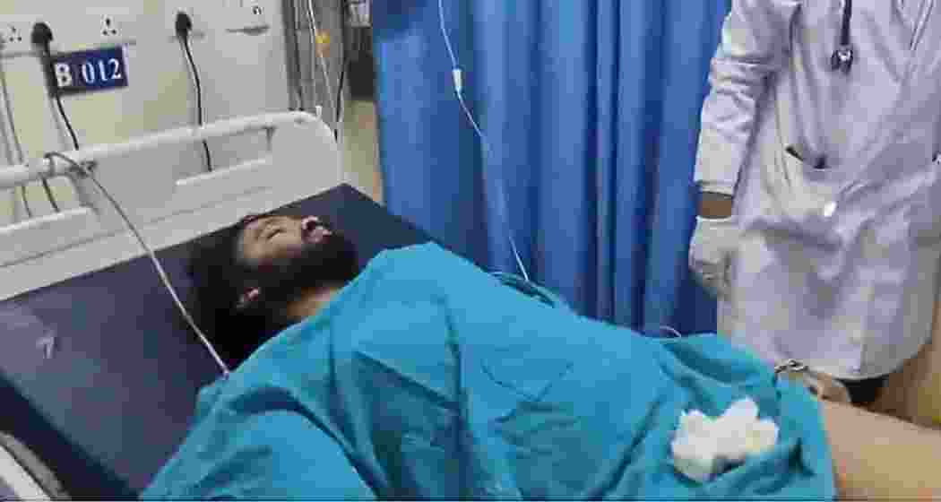Farhan Ali, the main accused in the Bhopal student rape case, receives treatment at a hospital after being shot in the leg during an alleged attempt to escape police custody. Farhan Ali, the main accused in the Bhopal student rape case, receives treatment at a hospital after being shot in the leg during an alleged attempt to escape police custody.