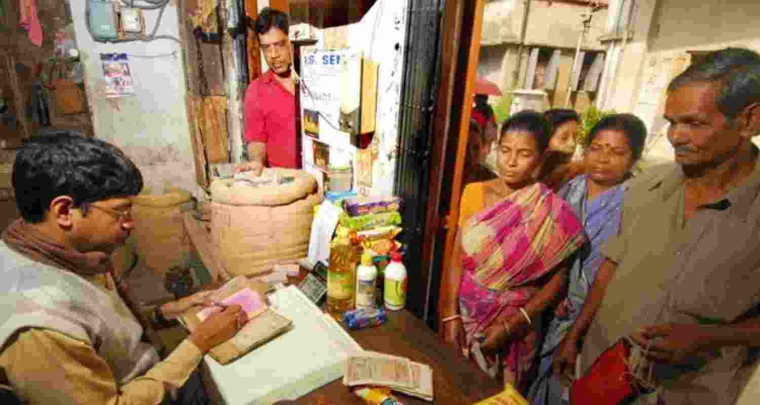 People line up at a ration shop. Image via X. People line up at a ration shop. Image via X.