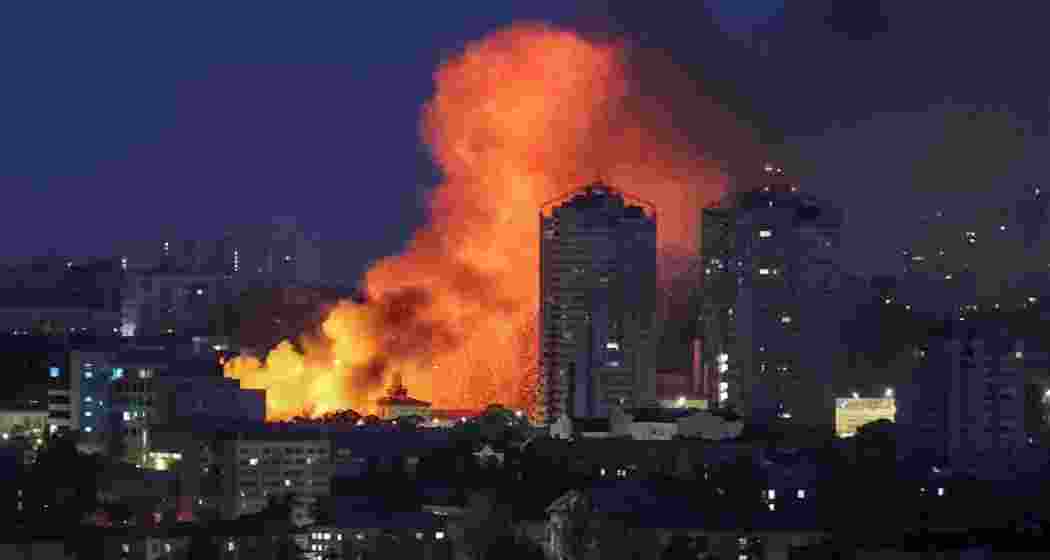 Smoke rises above Kyiv following Russia’s retaliatory drone and missile assault on Friday. The barrage caused multiple fatalities, infrastructure damage, and sparked fires in residential and industrial areas across the capital. Smoke rises above Kyiv following Russia’s retaliatory drone and missile assault on Friday. The barrage caused multiple fatalities, infrastructure damage, and sparked fires in residential and industrial areas across the capital.