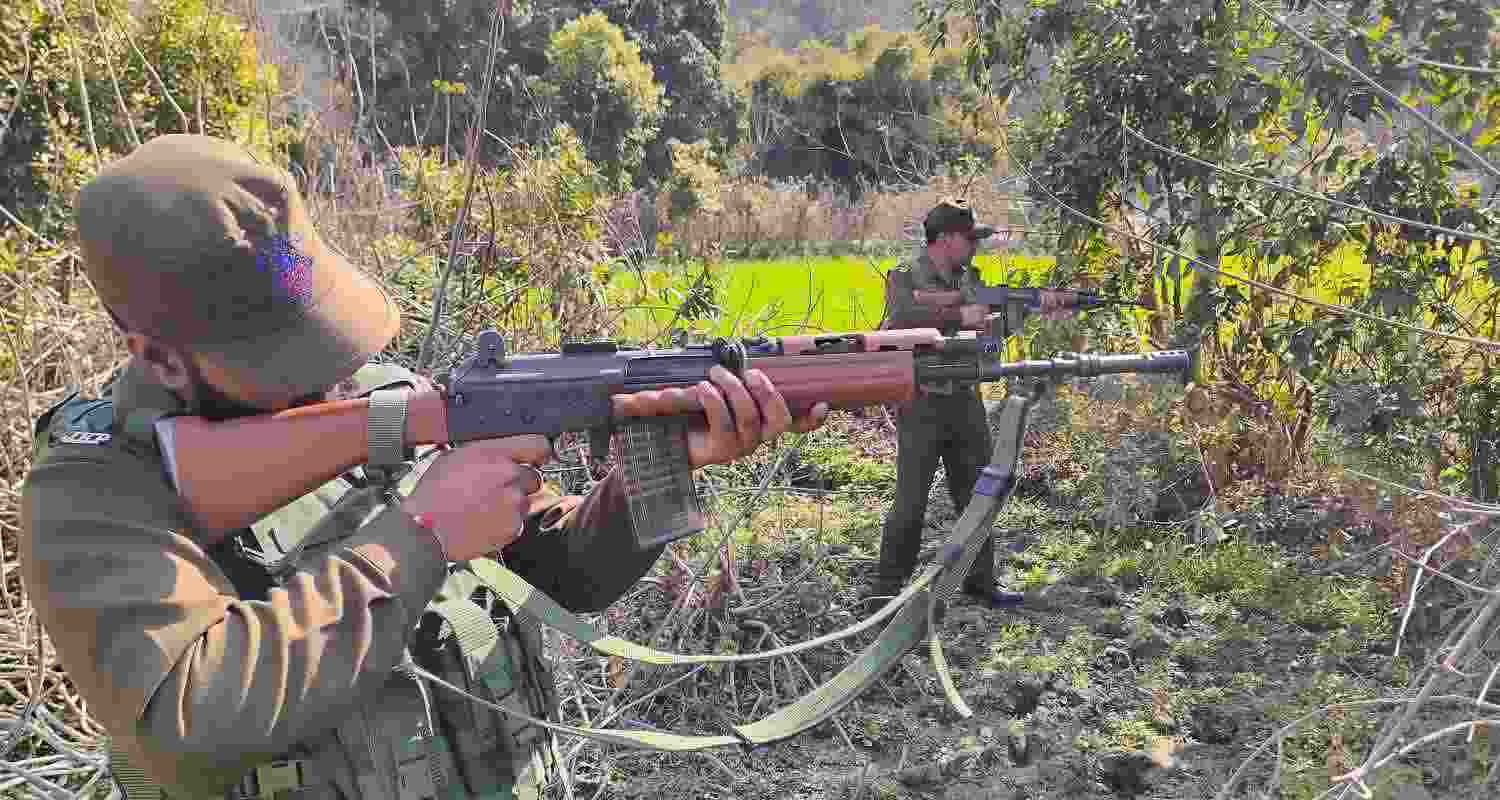 Security personnel during a search operation near LoC forest area, in Akhnoor sector in Jammu, Saturday. Security personnel during a search operation near LoC forest area, in Akhnoor sector in Jammu, Saturday.