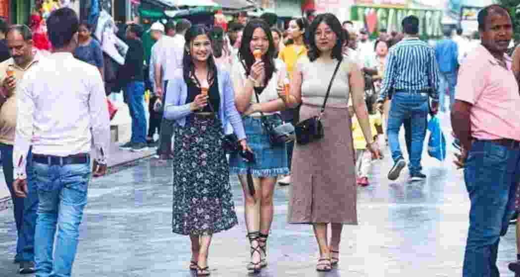 People enjoy ice cream as Sikkim witnesses its hottest-ever September this year. People enjoy ice cream as Sikkim witnesses its hottest-ever September this year.