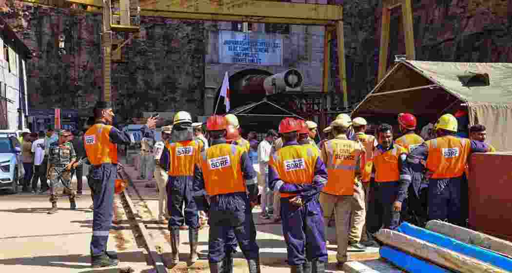 Members of National Disaster Response Force (NDRF) prepare for a rescue operation at Srisailam Left Bank Canal (SLBC) project tunnel in Nagarkurnool district of India's Telangana. Members of National Disaster Response Force (NDRF) prepare for a rescue operation at Srisailam Left Bank Canal (SLBC) project tunnel in Nagarkurnool district of India's Telangana.