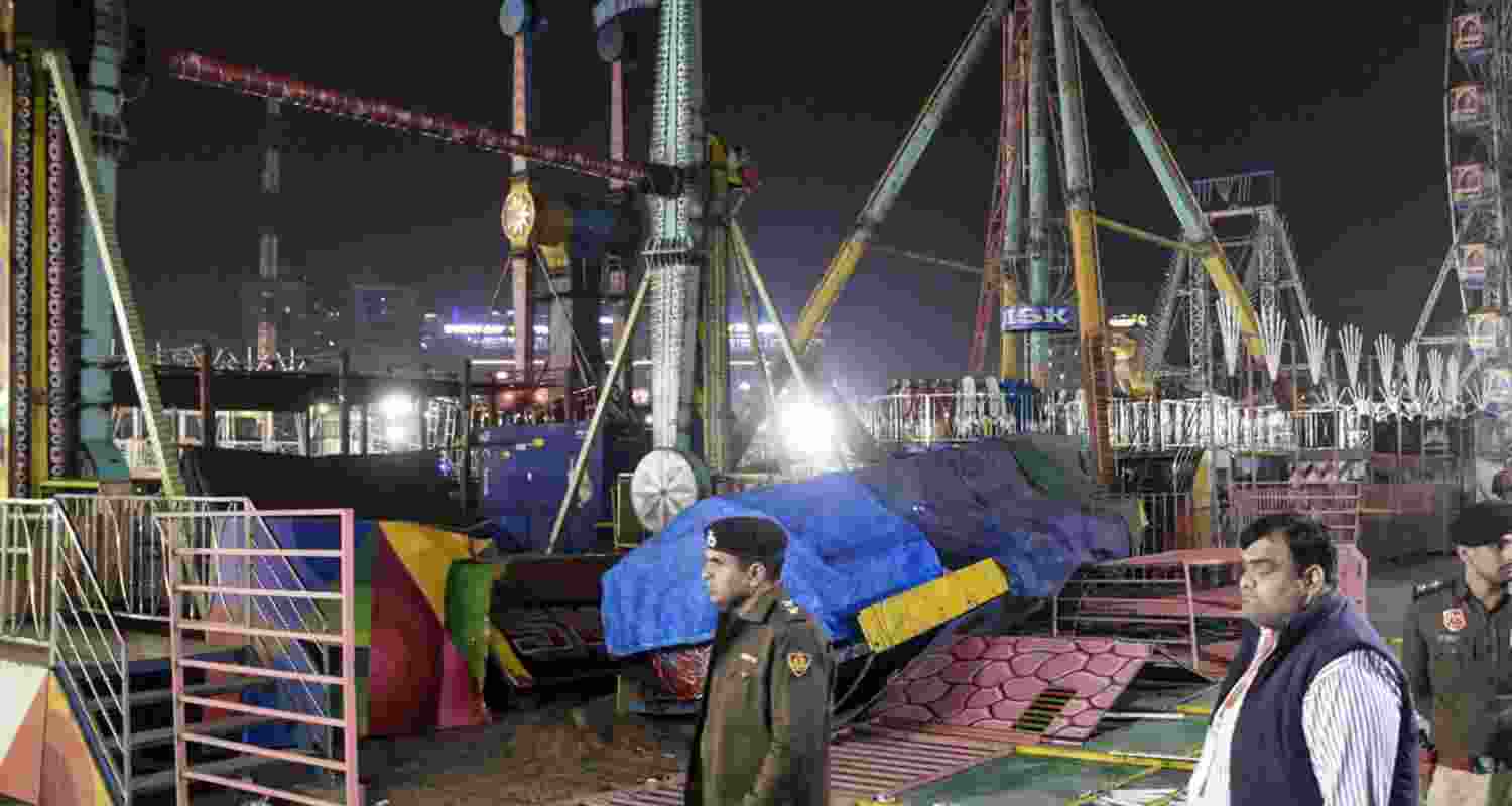 Police personnel at the spot after a swing fell down at Surajkund fair, in Faridabad, Saturday, Feb. 7, 2026. A police officer was killed and 13 other suffered injuries. Police personnel at the spot after a swing fell down at Surajkund fair, in Faridabad, Saturday, Feb. 7, 2026. A police officer was killed and 13 other suffered injuries.