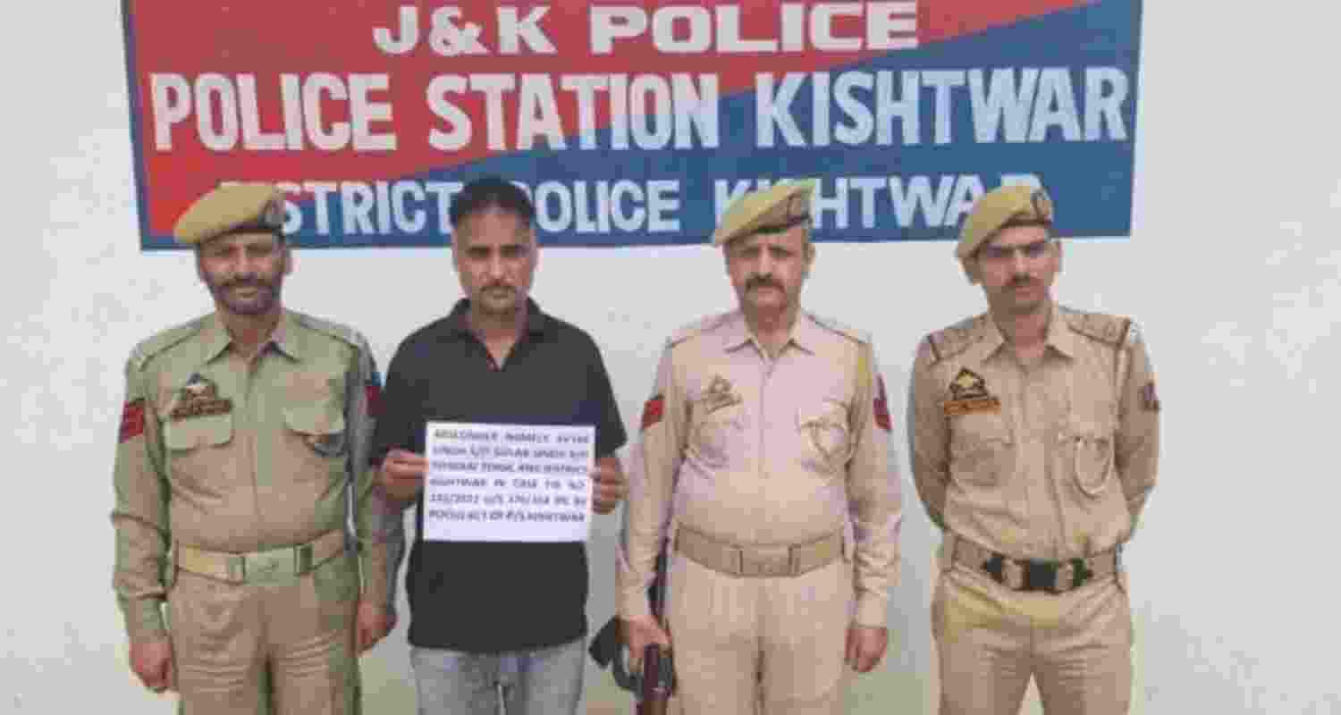 The accused being taken into custody by J&K Police following his arrest in Himachal Pradesh. The accused being taken into custody by J&K Police following his arrest in Himachal Pradesh.