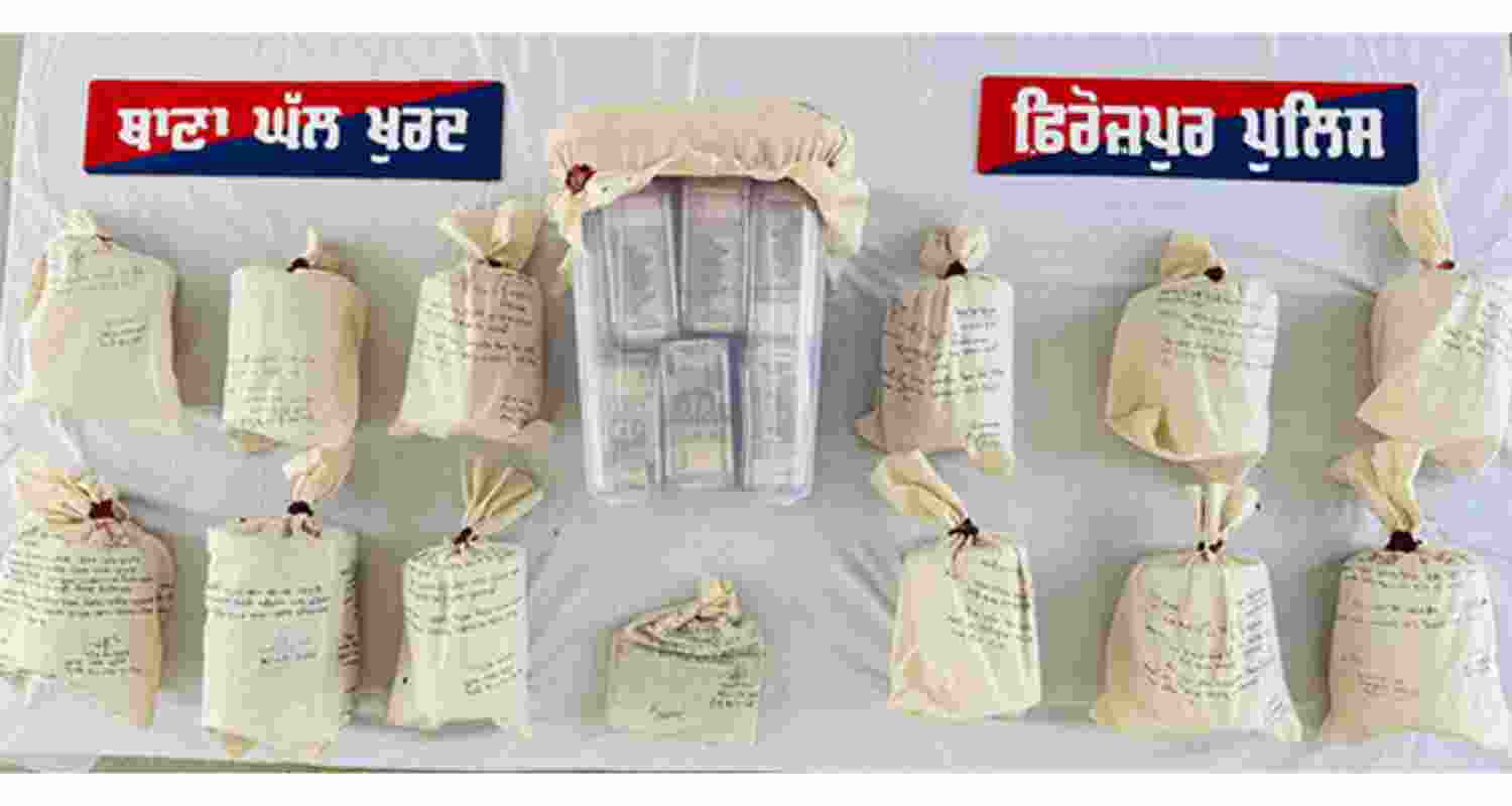 The Punjab Police seize 12 kg heroin, Rs 25 lakh. The Punjab Police seize 12 kg heroin, Rs 25 lakh.