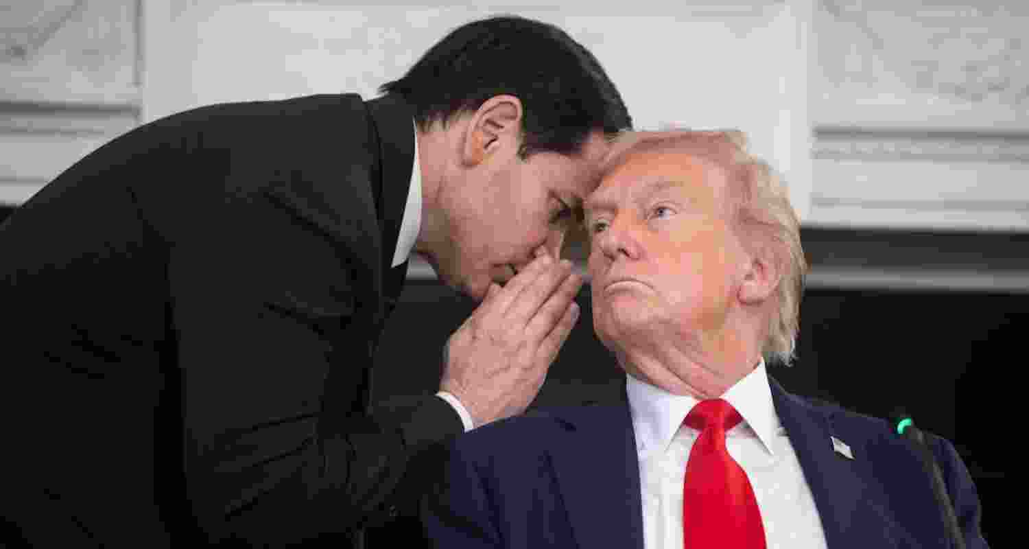 US Secretary of State Marco Rubio (left) whispers to President Donald Trump at the White House on October 8. US Secretary of State Marco Rubio (left) whispers to President Donald Trump at the White House on October 8.
