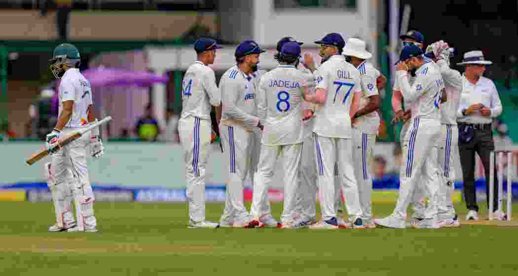 India's Akash Deep with teammates celebrates the wicket of Shadman Islam during the first day of the 2nd cricket Test match between India and Bangladesh at the Green Park Stadium, in Kanpur, Friday, Sept. 27, 2024. India's Akash Deep with teammates celebrates the wicket of Shadman Islam during the first day of the 2nd cricket Test match between India and Bangladesh at the Green Park Stadium, in Kanpur, Friday, Sept. 27, 2024.