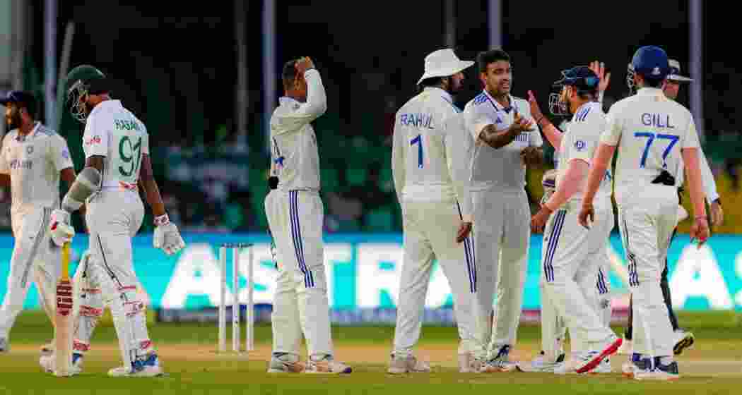 India's Ravichandran Ashwin with teammates celebrates the wicket of Hasan Mahmud during the fourth day of the 2nd Test cricket match between India and Bangladesh, at the Green Park stadium, Kanpur, Monday, Sept. 30, 2024. India's Ravichandran Ashwin with teammates celebrates the wicket of Hasan Mahmud during the fourth day of the 2nd Test cricket match between India and Bangladesh, at the Green Park stadium, Kanpur, Monday, Sept. 30, 2024.