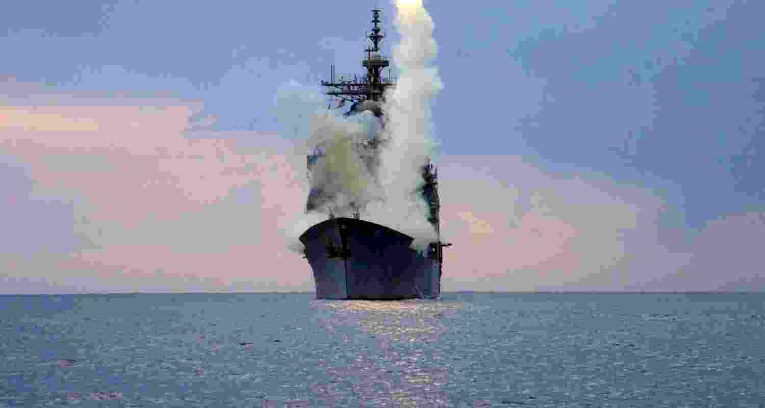 A Tomahawk Land Attack Missile (TLAM) is launched from the guided missile cruiser USS Cape St. George, arch. A Tomahawk Land Attack Missile (TLAM) is launched from the guided missile cruiser USS Cape St. George, arch.