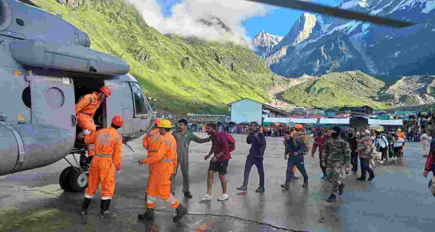 NDRF and IAF personnel conduct a rescue operation at Gaucher following the cloud burst in Uttarakhand. NDRF and IAF personnel conduct a rescue operation at Gaucher following the cloud burst in Uttarakhand.