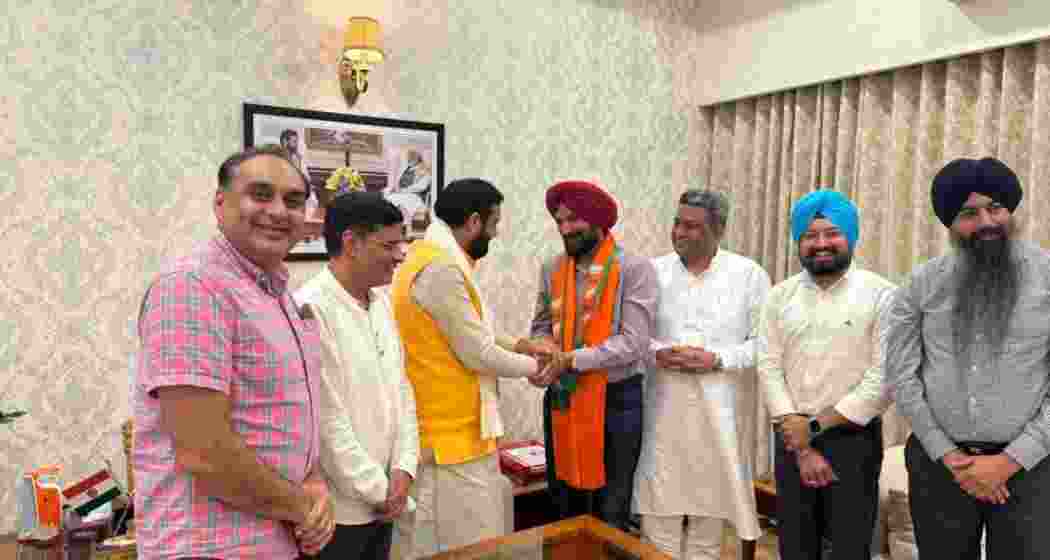 Haryana Chief Minister Nayab Singh Saini inducting former Akali leader Ranjit Singh Gill into the BJP in Chandigarh on Friday. Haryana Chief Minister Nayab Singh Saini inducting former Akali leader Ranjit Singh Gill into the BJP in Chandigarh on Friday.